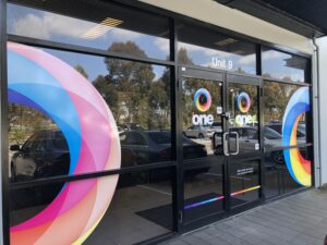 Image of front doors with logo of One Central Health in South Lake